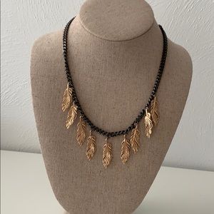 Stella & Dot hematite and gold feather necklace
